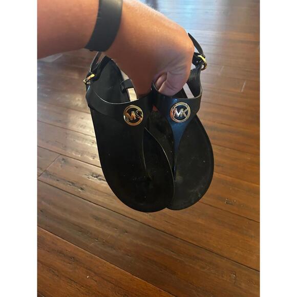 Michael Kors Black Thong Sandals with Gold Logo Accent - Picture 1 of 5